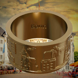 Ring aus vergoldetem Edelstahl mit Reliefs bekannter Sehenswürdigkeiten der Stadt Bonn und einer Gravur des Stadtnamens auf der Innenseite. Den Hintergrund bildet eine Ansicht der Stadt Bonn.
