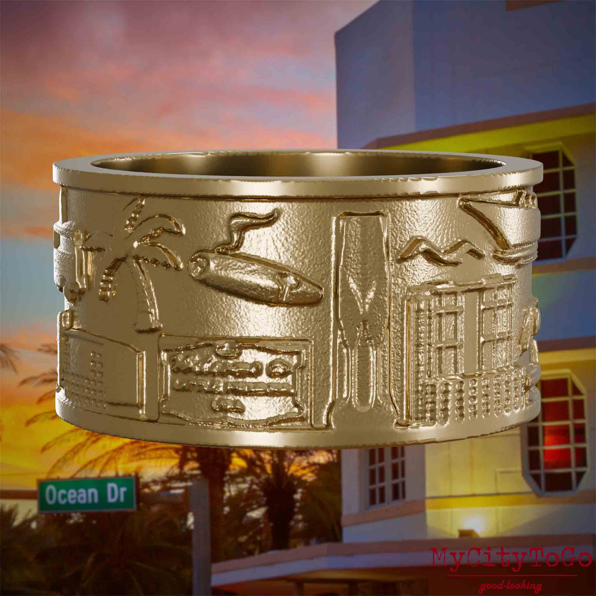 Ring aus vergoldetem Edelstahl mit Reliefs bekannter Sehenswürdigkeiten der Stadt Miami. Den Hintergrund bildet eine Ansicht der Stadt Miami.