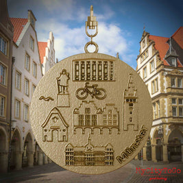 Halskette mit Drehwirbel und Rückseite eines Schmuckanhängers aus vergoldetem Edelstahl, auf dem Reliefs bekannter Sehenswürdigkeiten der Stadt Muenster abgebildet sind. Den Hintergrund bildet eine Ansicht der Stadt Muenster.
