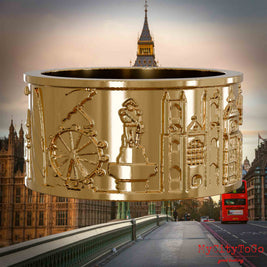 Vergoldeter Ring mit Reliefs bekannter Sehenswürdigkeiten der Stadt London. Den Hintergrund bildet eine Ansicht der Stadt London.