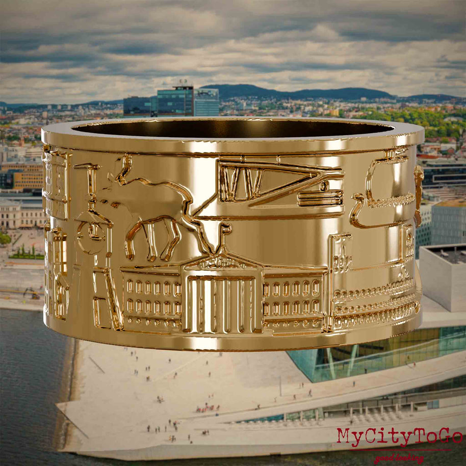 Vergoldeter Ring mit Reliefs bekannter Sehenswürdigkeiten der Stadt Oslo. Den Hintergrund bildet eine Ansicht der Stadt Oslo.