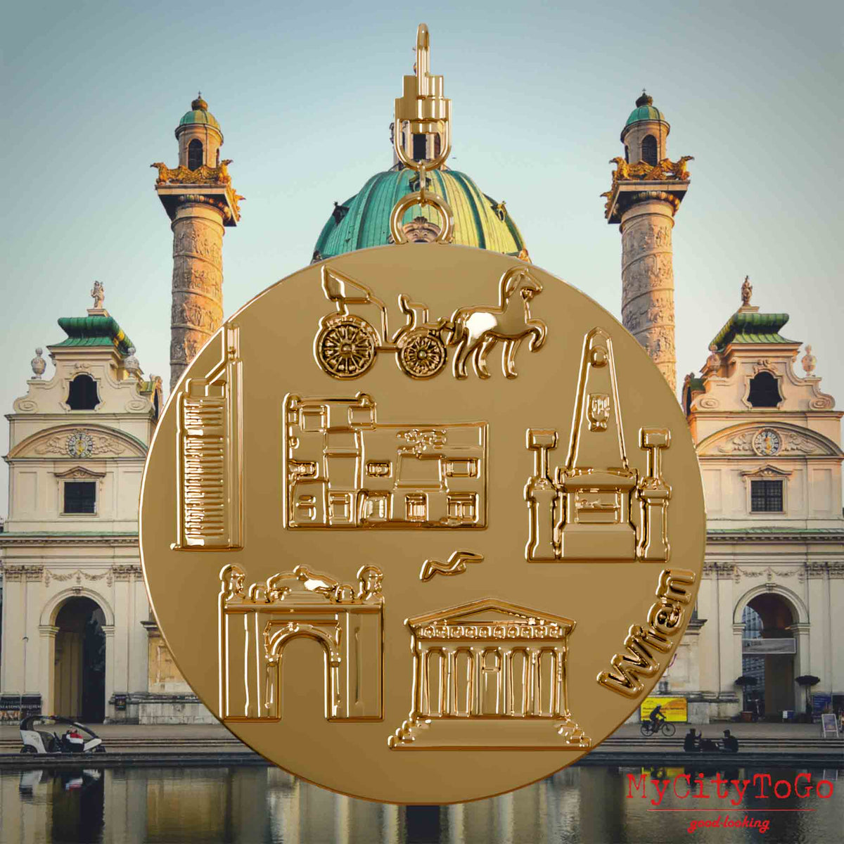 Halskette mit Drehwirbel und Vorderseite eines vergoldeten Schmuckanhängers, auf dem Reliefs bekannter Sehenswürdigkeiten der Stadt Wien abgebildet sind. Den Hintergrund bildet eine Ansicht der Stadt Wien.
