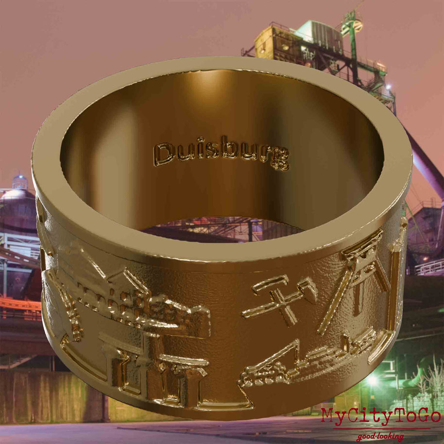 Ring aus vergoldetem Edelstahl mit Reliefs bekannter Sehenswürdigkeiten der Stadt Duisburg und einer Gravur des Stadtnamens auf der Innenseite. Den Hintergrund bildet eine Ansicht der Stadt Duisburg.