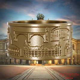 Ring aus vergoldetem Edelstahl mit Reliefs bekannter Sehenswürdigkeiten der Stadt Dresden. Den Hintergrund bildet eine Ansicht der Stadt Dresden.