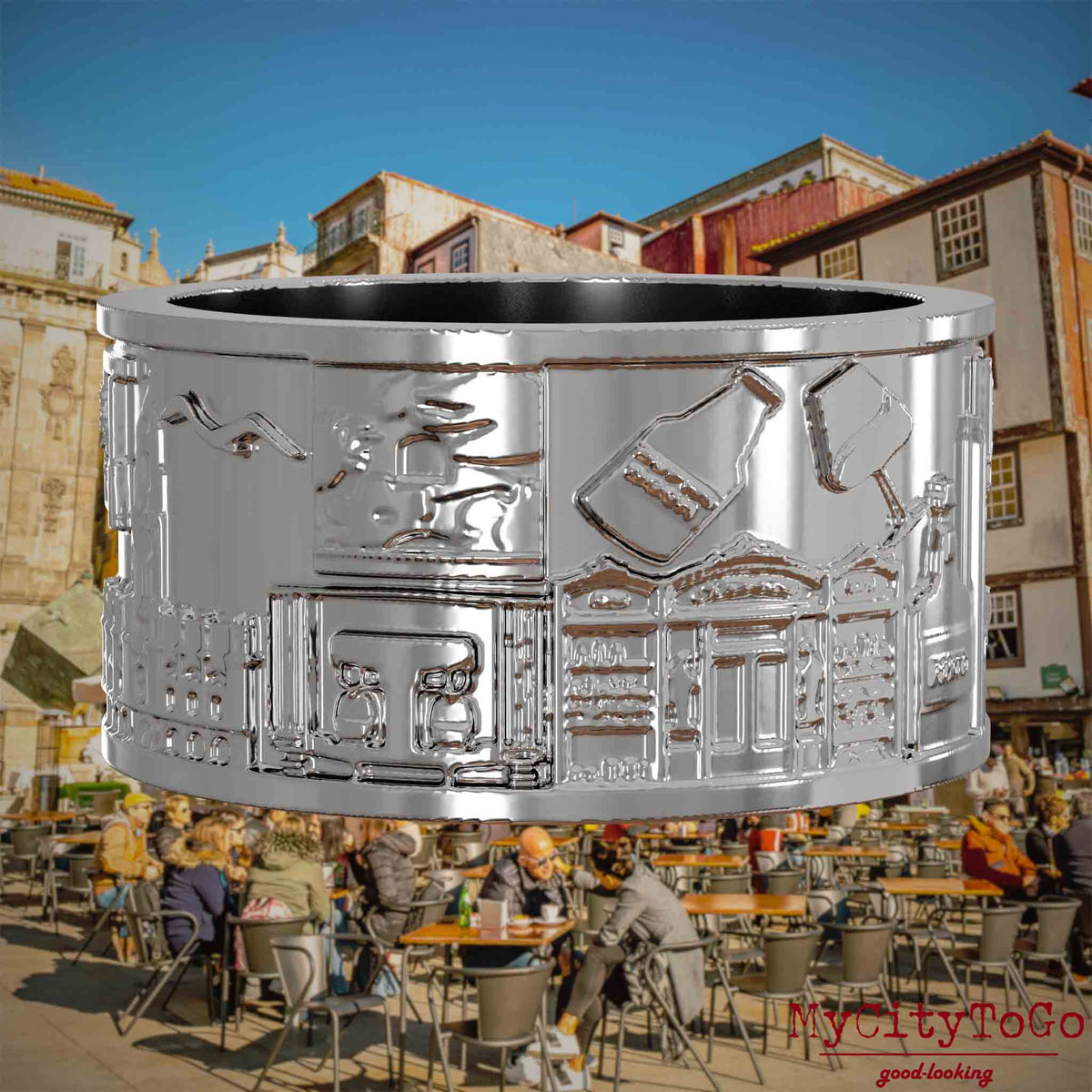 Silberner Ring mit Reliefs bekannter Sehenswürdigkeiten der Stadt Porto. Den Hintergrund bildet eine Ansicht der Stadt Porto.