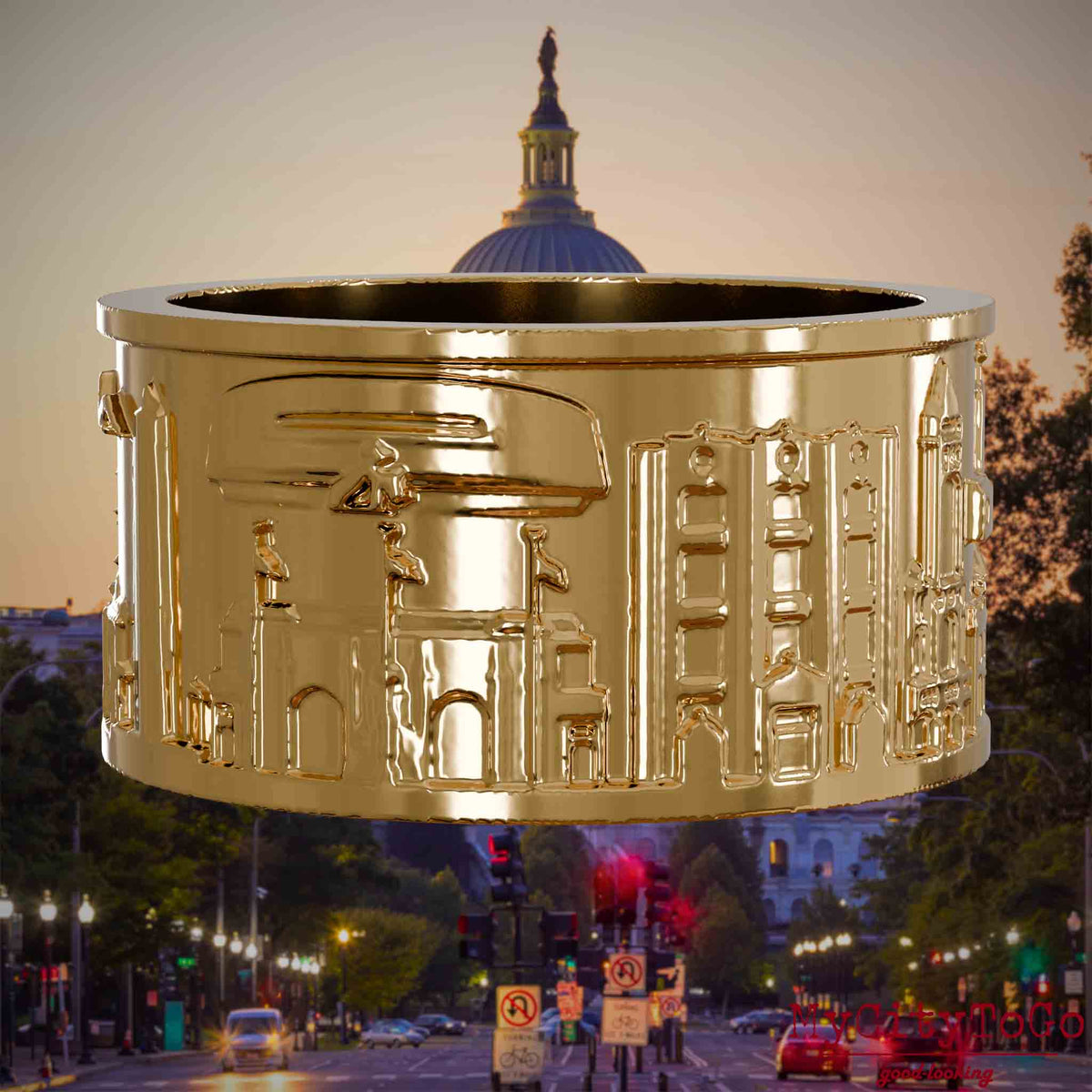 Vergoldeter Ring mit Reliefs bekannter Sehenswürdigkeiten der Stadt Washington. Den Hintergrund bildet eine Ansicht der Stadt Washington.