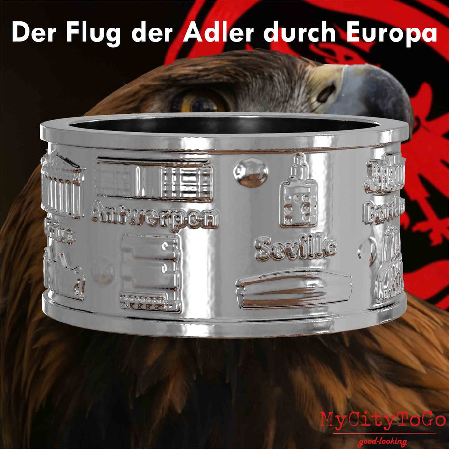Silberner Ring mit Reliefs bekannter Sehenswürdigkeiten der Spielorte und Stadien der Frankfurter Europa-League-Saison 2021/22 mit einem Adlerkopf als Hintergrund