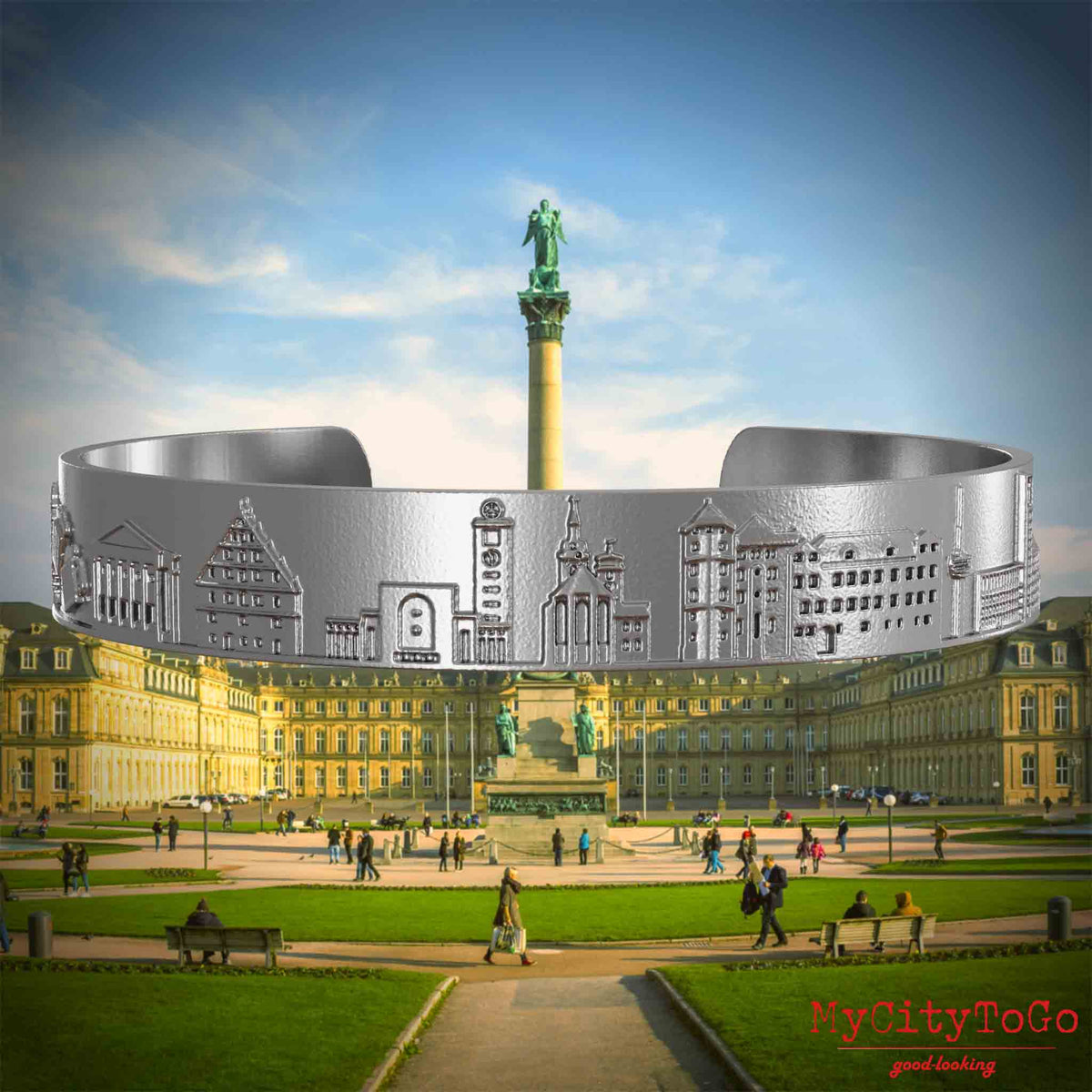 Armreif aus Edelstahl mit Reliefs bekannter Sehenswürdigkeiten der Stadt Stuttgart. Den Hintergrund bildet eine Ansicht der Stadt Stuttgart.
