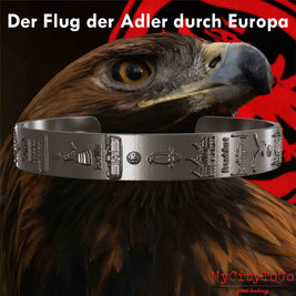 Armreif aus Titan mit Reliefs der Stadien und Sehenswürdigkeiten der Spielorte während der Europa-League-Saison 21/22 von Frankfurt mit einem Adlerkopf als Hintergrund