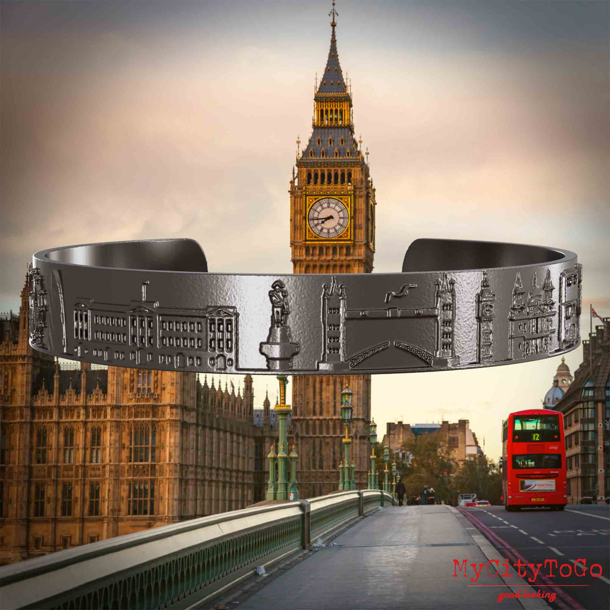 Amreif aus Titan mit Reliefs bekannter Sehenswürdigkeiten der Stadt London. Den Hintergrund bildet eine Ansicht der Stadt London.