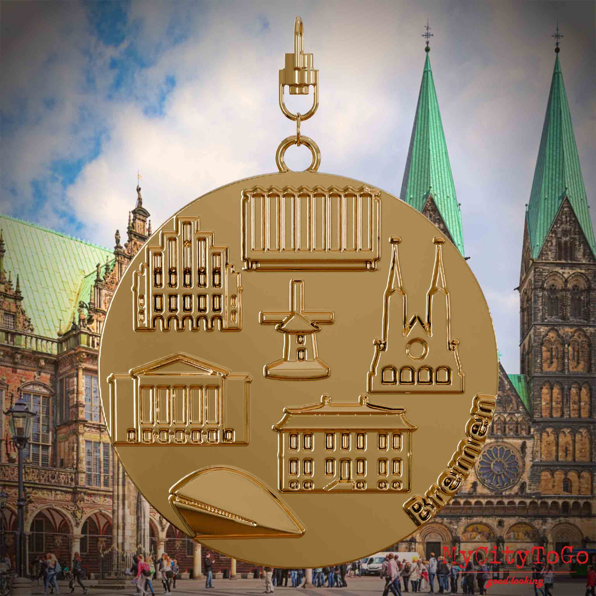 Halskette mit Drehwirbel und Rückseite eines vergoldeten Schmuckanhängers, auf dem Reliefs bekannter Sehenswürdigkeiten der Stadt Bremen abgebildet sind. Den Hintergrund bildet eine Ansicht der Stadt Bremen.