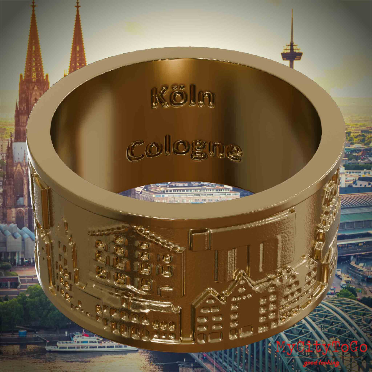 Ring aus vergoldetem Edelstahl mit Reliefs bekannter Sehenswürdigkeiten der Stadt Koeln und einer Gravur des Stadtnamens auf der Innenseite. Den Hintergrund bildet eine Ansicht der Stadt Koeln.