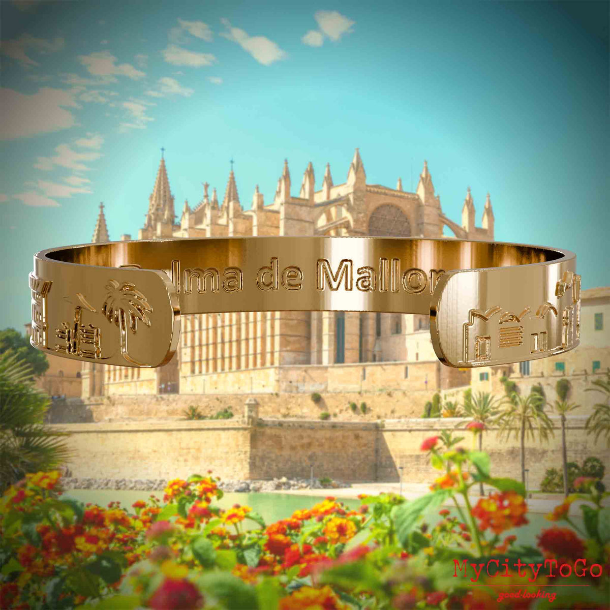 Innenseite eines vergoldeten Armreifs mit Reliefs bekannter Sehenswürdigkeiten der Stadt Palma de Mallorca und einer Gravur des Stadtnamens . Den Hintergrund bildet eine Ansicht der Stadt Palma de Mallorca.